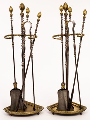 Lot 910 - A fine pair of burnished steel brass mounted...