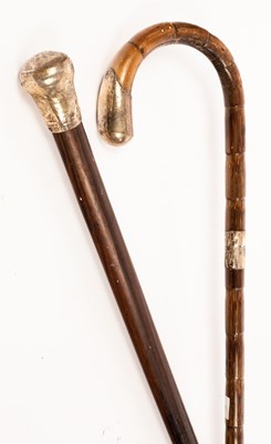 Lot 922 - A silver mounted walking cane with hoop handle...