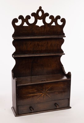 Lot 927 - An 18th Century oak spoon rack with pierced...