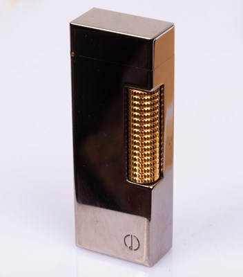 Lot 955 - A Dunhill lighter, No. 35431, boxed and with...