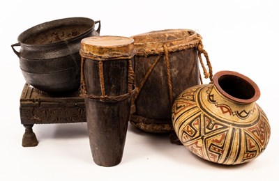 Lot 958 - Two tribal drums, a low stool, a cauldron and...