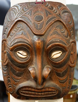 Lot 963 - A large tribal mask with carved decoration and...