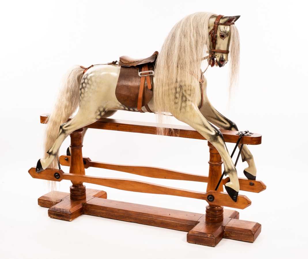 Lot 974 - An early 20th Century rocking horse by F H...