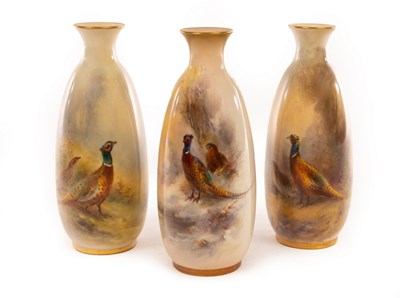 Lot 11 - Three Royal Worcester oviform vases with...