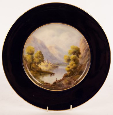Lot 14 - A Royal Worcester plate, 1922, painted a lake...