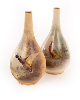 Lot 18 - Two Royal Worcester pear-shaped vases with...
