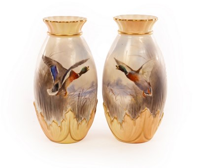 Lot 19 - A pair of Royal Worcester baluster vases with...
