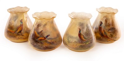 Lot 23 - Four Royal Worcester small tapering vases with...