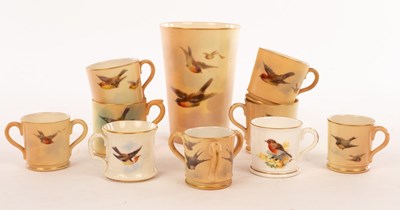 Lot 26 - A Royal Worcester miniature loving cup with...