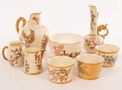 Lot 28 - A Royal Worcester jug with gilt handle and...