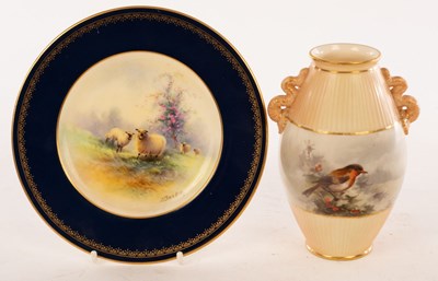 Lot 39 - A Royal Worcester vase painted a robin in...