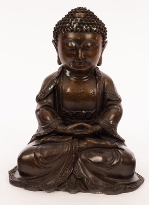 Lot 81 - A Chinese late 19th Century bronze Buddha,...