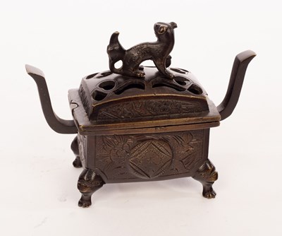 Lot 89 - A Japanese bronze incense burner with a copper...