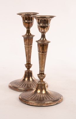 Lot 121 - A pair of silver candlesticks, HE & Co.,...