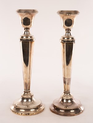 Lot 132 - A pair of silver candlesticks, Birmingham 1928,...