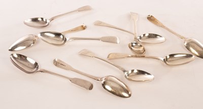 Lot 134 - Eight fiddle pattern silver tablespoons,...