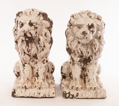 Lot 292 - A pair of modern glazed terracotta lions, with...