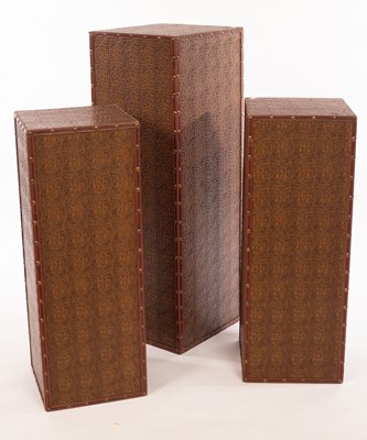 Lot 315 - Three modern plinths in faux crocodile skin...