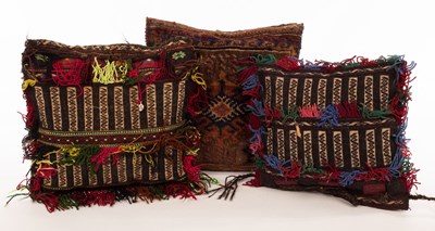 Lot 333 - Three vintage Afghan saddlebag cushions with...