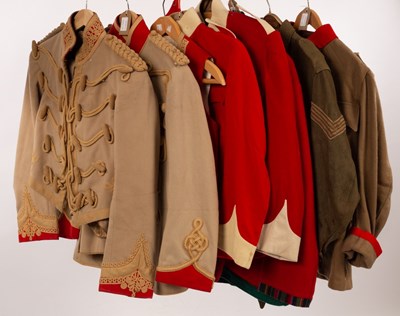 Lot 335 - A collection of military uniforms, jackets,...