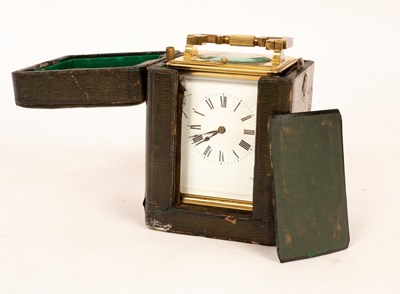 Lot 365 - A gilt brass half-hour repeat carriage clock...