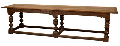 Lot 384 - A Charles II oak serving table, the quadruple...