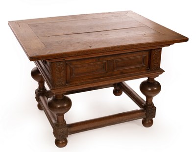 Lot 385 - A 17th Century Dutch oak counter table, the...