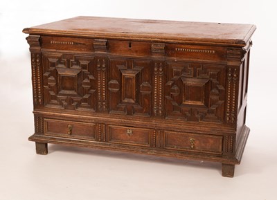 Lot 386 - An early 18th Century oak mule chest, the...