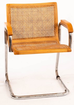 Lot 400 - An Italian cantilever chair with caned back...