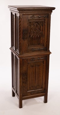 Lot 405 - A Gothic style cupboard with linenfold panels...