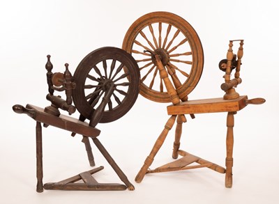 Lot 433 - Two spinning wheels, the largest 57cm diameter