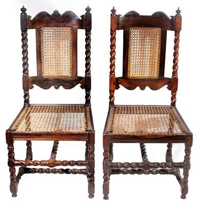 Lot 448 - A pair of Dutch colonial stinkwood cane back...