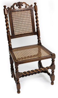 Lot 450 - A Charles II walnut cane back side chair with...