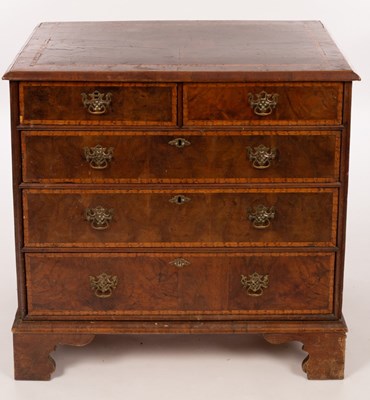 Lot 471 - A George I figured walnut and holly banded...