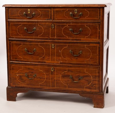 Lot 472 - A George I yew wood chest, of two short and...