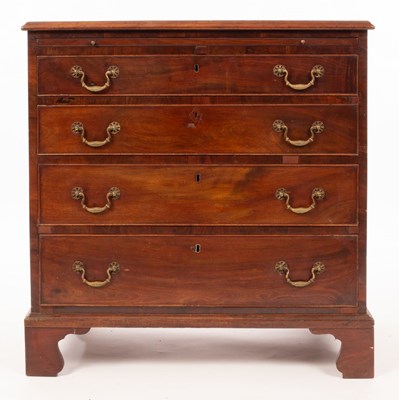 Lot 476 - A George III mahogany chest fitted a brushing...