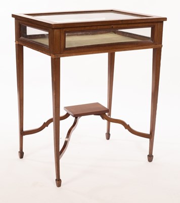 Lot 485 - An Edwardian vitrine table, the hinged glazed...