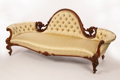 Lot 506 - A Victorian sofa with central moulded arch,...