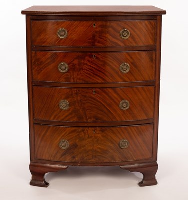 Lot 522 - A mahogany bowfront chest of four drawers, on...