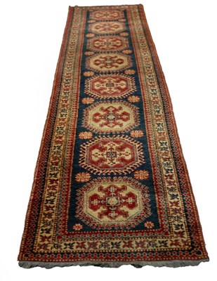 Lot 530 - A Hamadan runner, the central blue ground...