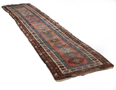 Lot 531 - A Hamadan runner, the central aubergine field...