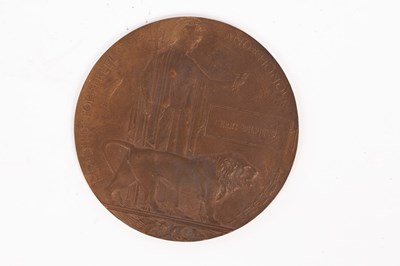 Lot 145 - A group of three World War I medals, 1914 Star...
