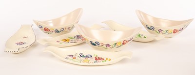 Lot 222 - Poole Pottery, three floral boat-shaped dishes,...