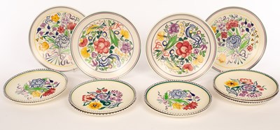 Lot 249 - Poole Pottery, four floral shallow serving...