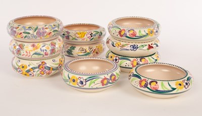 Lot 255 - Poole Pottery, ten posy dishes, 14cm diameter