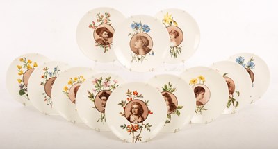 Lot 291 - A set of twelve Coalport plates, each painted...