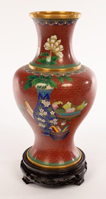 Lot 320 - A Cloisonné vase of baluster shape on a wooden...