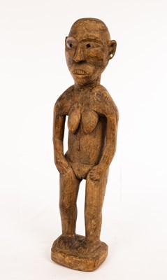 Lot 332 - An African carved tribal figure of a grotesque...