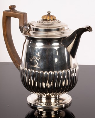 Lot 362 - A George III silver hot water jug, James...