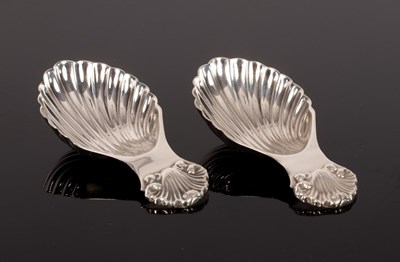 Lot 370 - A pair of silver shell pattern caddy spoons, S...